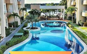 Guarajuba Porto Smeralda Village C02, térreo - GUARAJUBA TEMPORADA, viva mais de uma experiência de hospedagem conosco! 130m da praia